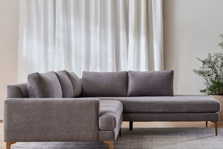 Statement sofa and armchair lounge fit-out by Mistry Interiors